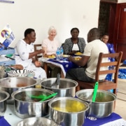 Jane having lunch with the Mothers' Union Uganda