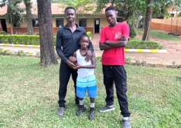 Three former street children from Kampala