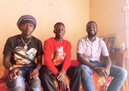 Two former street boys now in work in Uganda